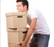 Man in pain, carrying boxes
